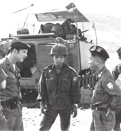 U.S. advisor confers with ARVN 3rd Cav commander