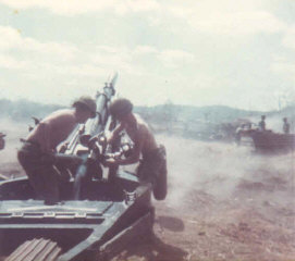 Gun 6 of the 2/17th Artillery firing for effect